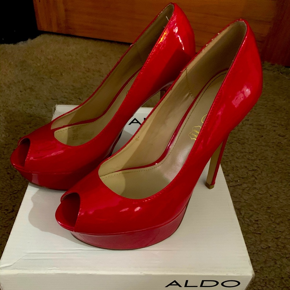 SOLD — Red Aldo peep toed high heels